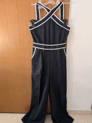 Jumpsuit new, black with white piping, sizes S and M