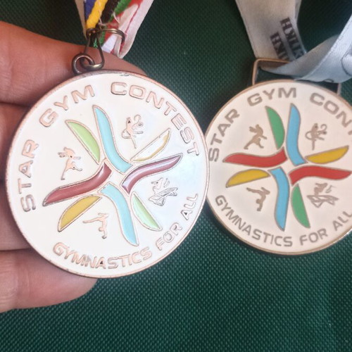 Set of 2 Star Gym Contest 2016 commemorative medals like new