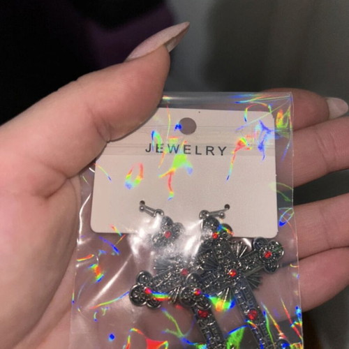 Cross earrings like new with red phosphorescent details