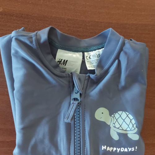 Baby swimsuit H&M 6-12M with sun protection like new, petrol color