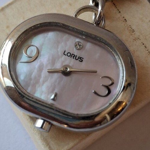 Lorus Quartz watch used, beige and silver, good condition