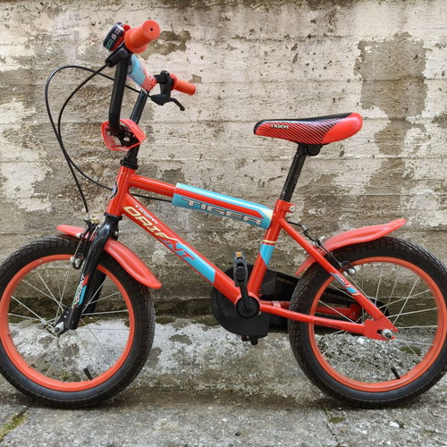 Children's bicycle used, 16-inch wheels, city style, red