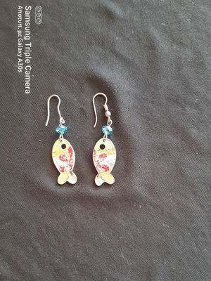 Earrings like new, uniquely painted on one side