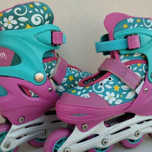 Xspot adjustable rollers size 35/37 used, turquoise pink with flowers