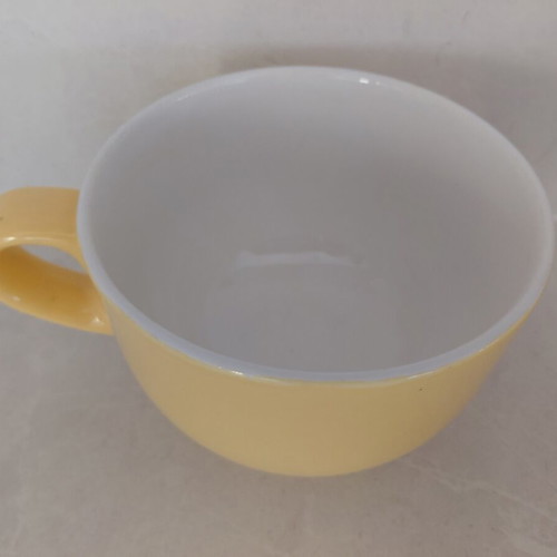 Cup like new, yellow with white interior, suitable for cereals