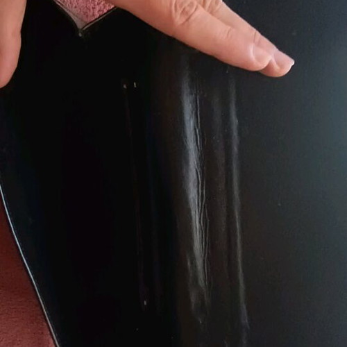 Leather envelope bag used, black handheld from Greek workshop