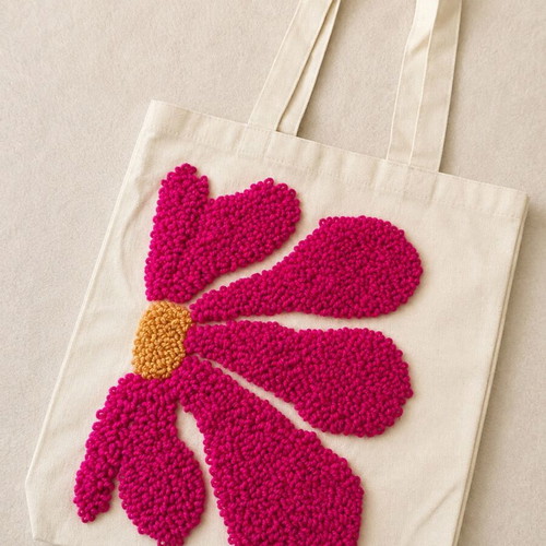 Handmade women's shoulder bag with flower design