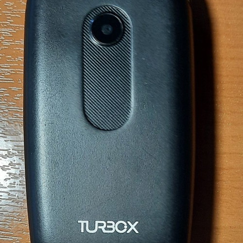 TurboX MiniFlip II small mobile phone with defect