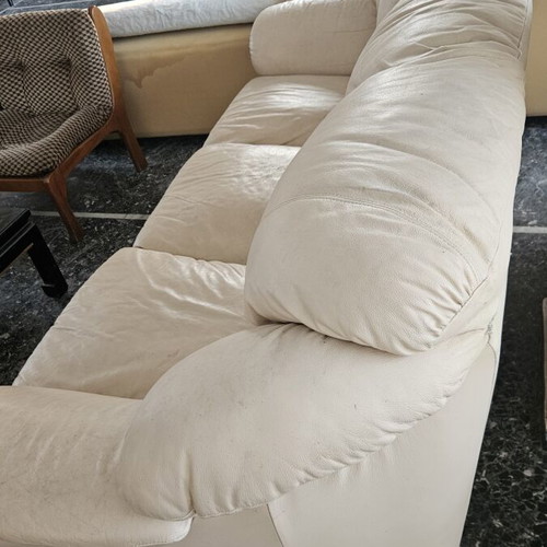 Leather three-seater sofa used, beige color