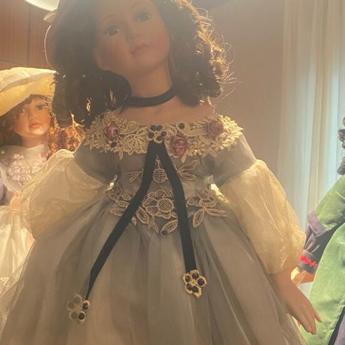 Porcelain doll like new from collection
