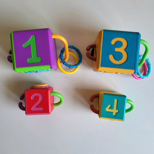 4 Hasbro Chain Cubes used, educational toy