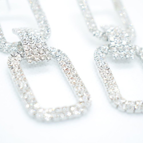 Earrings in silver color with gliter new