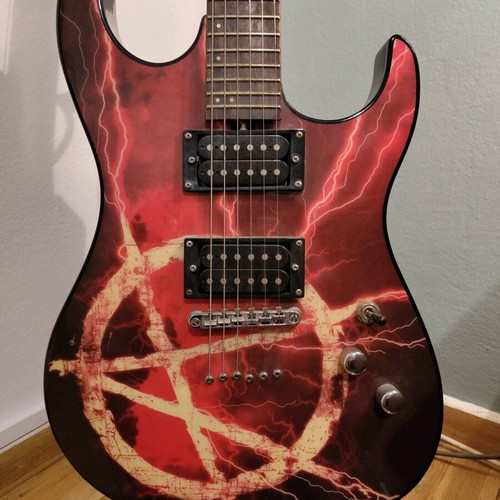Washburn X16 "Anarchy" electric guitar used with accessories