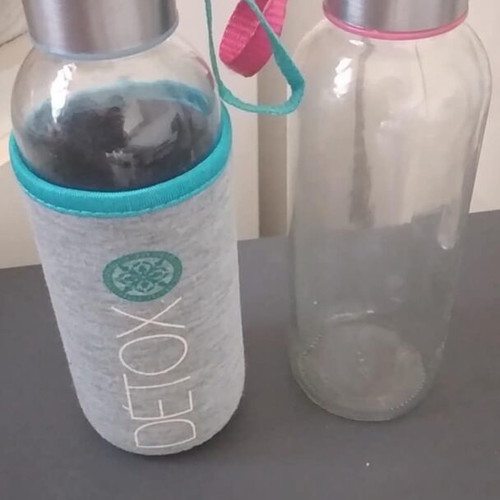 Glass water bottles like new, blue and fuchsia with fabric handle
