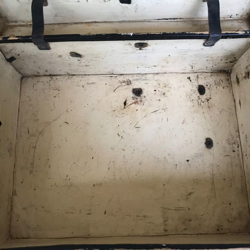 Small antique suitcase used with wear