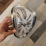 Decorative clock imitating melting clock