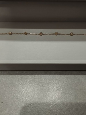 9k gold bracelet with diamond-studded beads