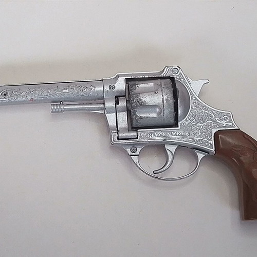 Vintage metal twelve-shot pistol Lone Star Peacemaker Colt 45 used
