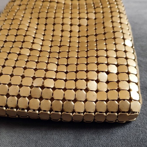 Skondras evening mesh metal handbag used, gold color