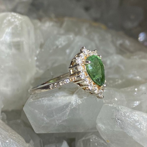 Silver ring with natural green tourmaline and moissanite