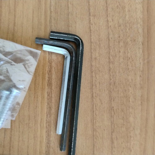 Various tools set used with 2 screwdrivers, 4 allen keys, screws and nails