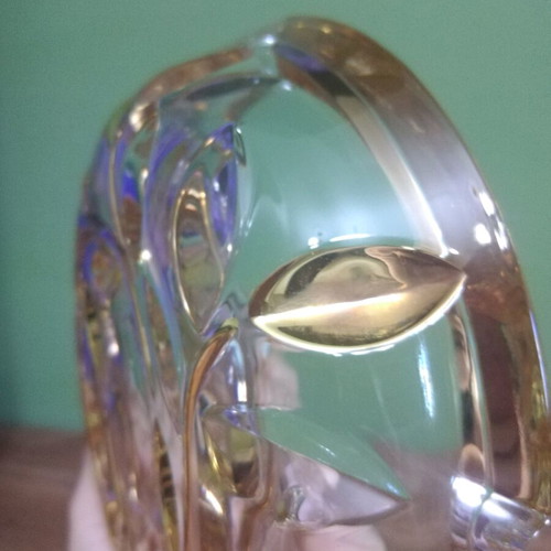 Crystal ashtray used, heavy with embossed gold-plated designs