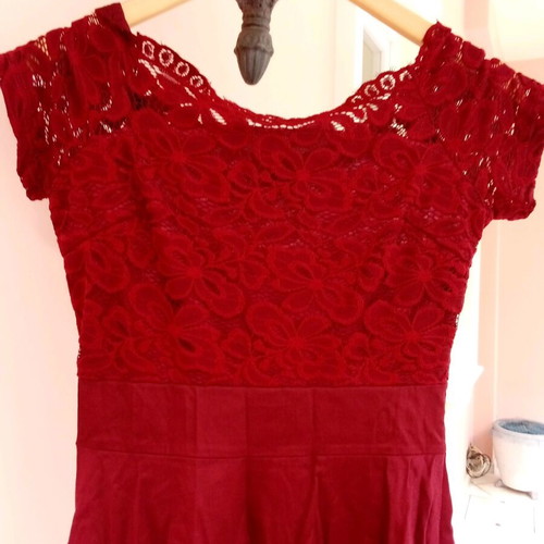 Women's asymmetrical dress new, size small, lace detail