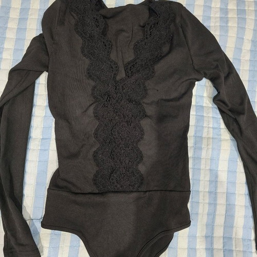 Bodysuit with lace design small, like new