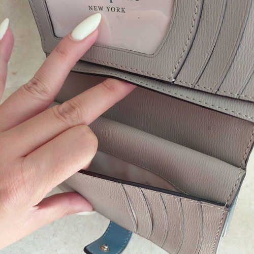 Kate Spade wallet new, turquoise with multiple card slots