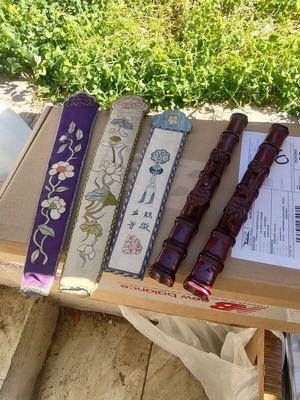 Chinese sticks like new with carved wooden cases and embroidered 19th-century cloths