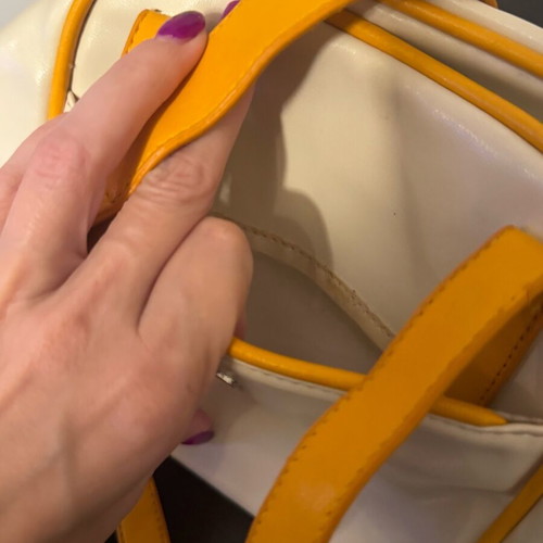 Handheld bag beige and orange colors like new