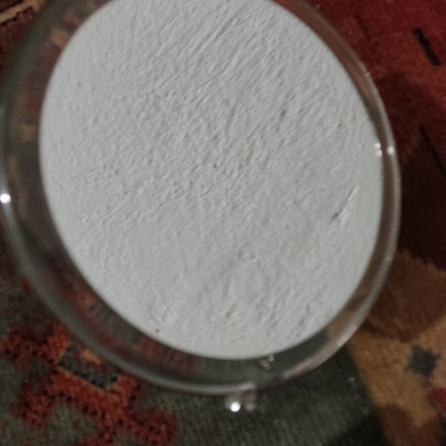 Small mirror used with magnifying side
