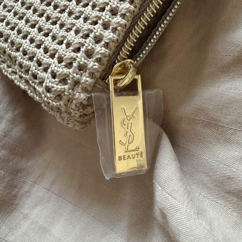 Yves Saint Laurent clutch bag, beige, new with tags