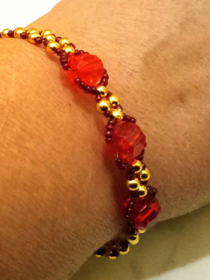 Handmade beaded bracelet new, red and gold beads
