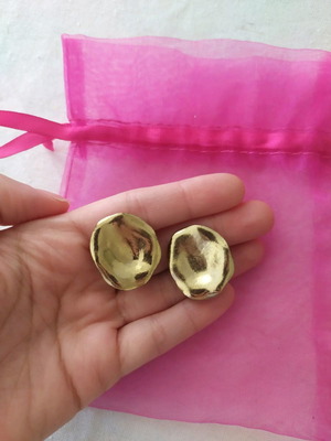 Women's stainless steel earrings like new, clip closure