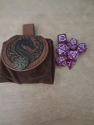 Brown leather dragon dice bag with purple D&D dice set