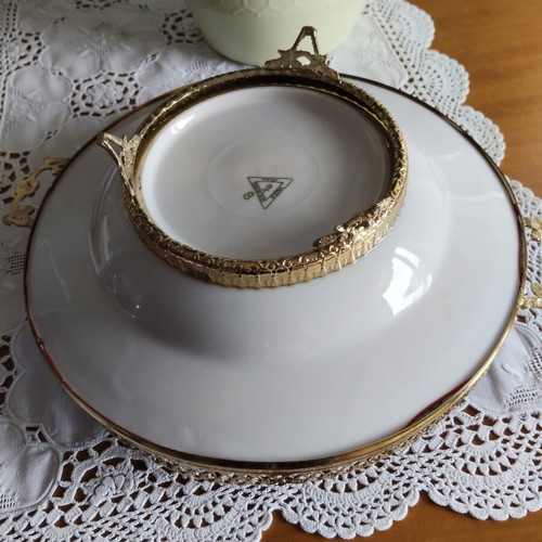 Vintage porcelain decorative plate with gilded details
