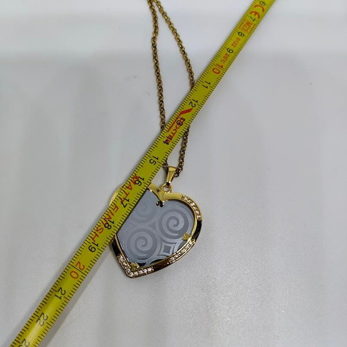 Heart Pendant Necklace with Embossed Spiral Designs, like new