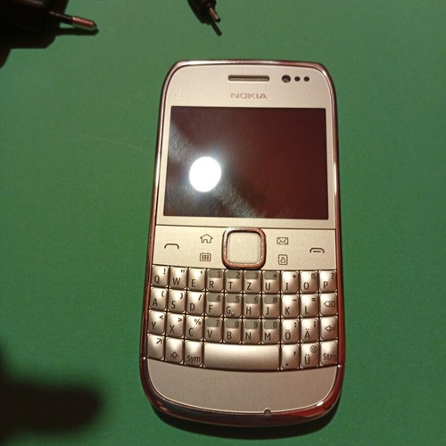 Nokia E6-00 mobile phone, silver, 8 MP camera, Symbian Anna