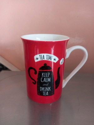 Tea mug like new with tea time design