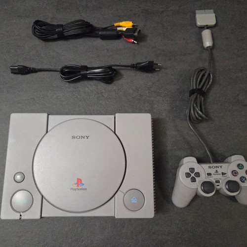 Sony PlayStation SCPH-7502 PS1 console used with Dualshock controller