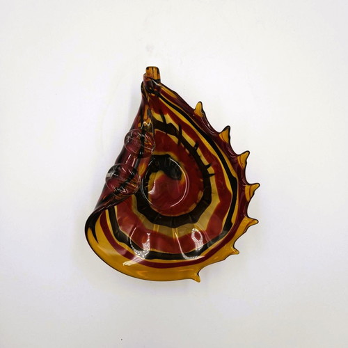 Glass ashtray used red with shell design