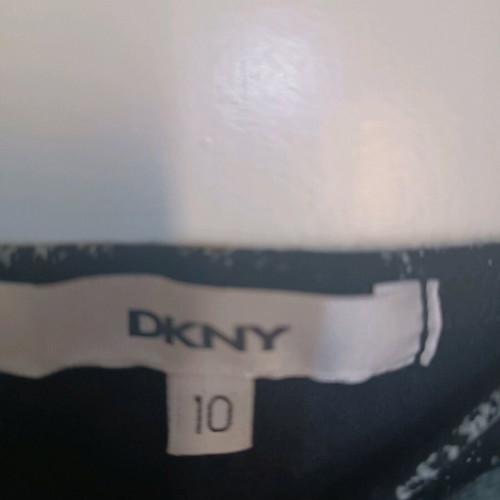 DKNY black dress like new, elastic fabric, size small