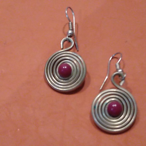Earrings with purple beads