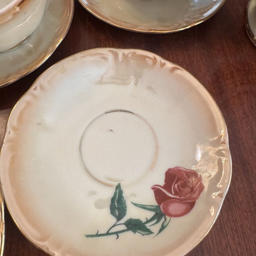 Vintage porcelain tea set with flowers and gold details, like new