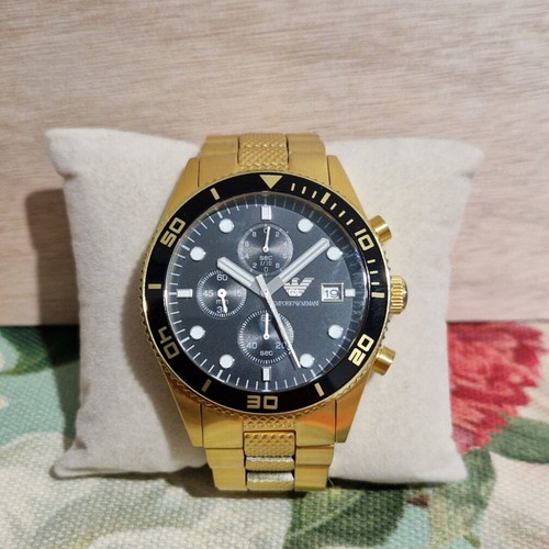 Emporio Armani men's watch in gold color like new
