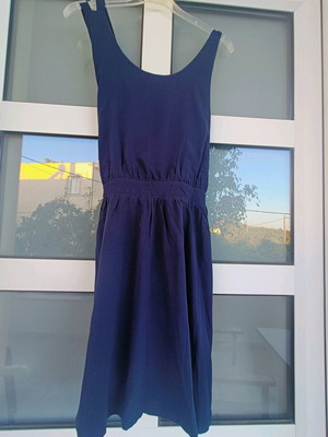 Regalinas dress size S like new, dark blue with bow detail