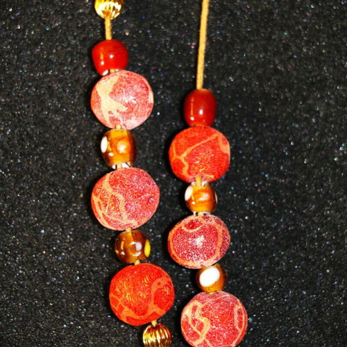 Begleri with genuine coral and 22K gold-plated beads, handmade by Indico Jewells
