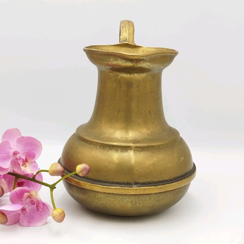 Old bronze pitcher used, vintage vase