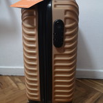 Small suitcase new, gold color